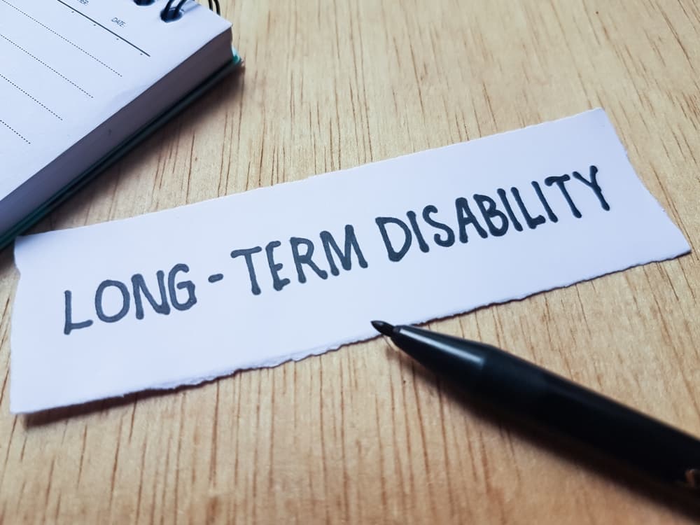 long-term disability written on a paper