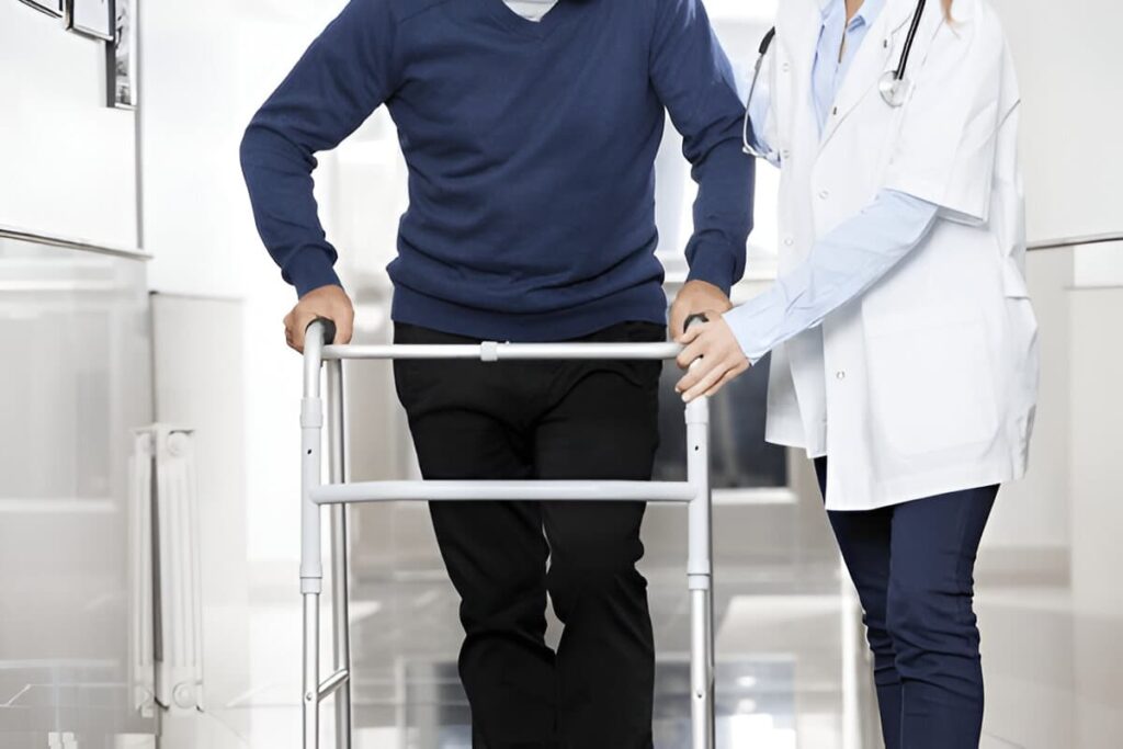 A doctor supports a senior using a walker, symbolizing the urgency of meeting long-term disability deadlines after COVID-19-related impairments.