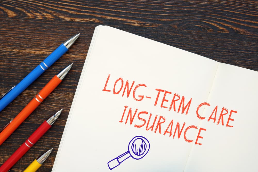 Conceptual photo about Long-Term Care Insurance with handwritten text.